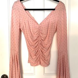 Free People long flare sleeve top.